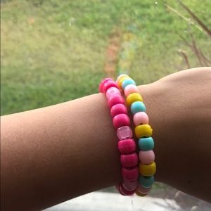 a set of 2 vsco bracelets.